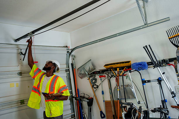 Professional Garage Door technician working in Marion Center, MA